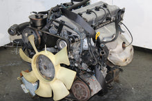 Load image into Gallery viewer, JDM 1998-2004 Nissan Frontier Motor KA24-RWD 2.4L 4 Cyl Engine | JDM Engine Direct